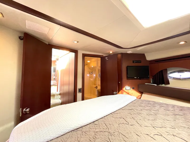 Slide: The Image of Luxurious interior of 2012 Meridian 441 Sedan yacht bedroom with modern amenities. - 26