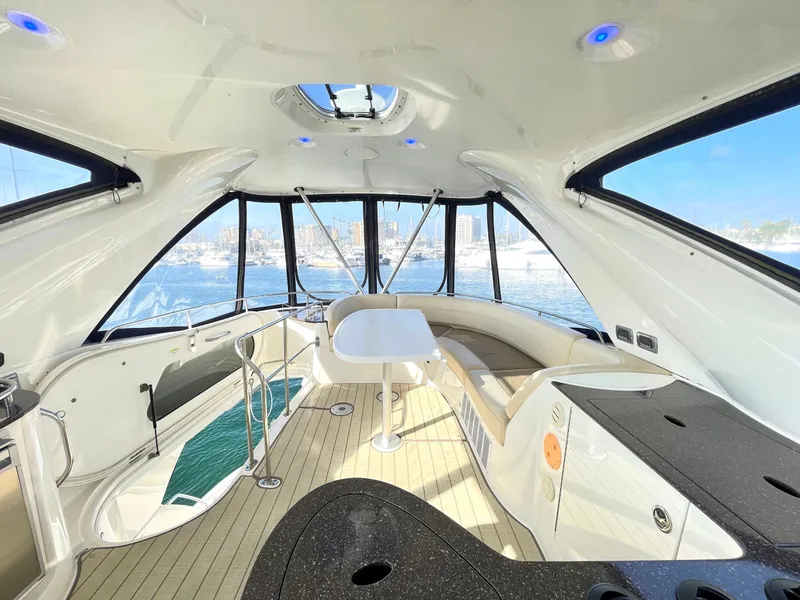 Slide: The Image of Luxurious interior of a 2012 Meridian 441 Sedan yacht with panoramic windows. - 41