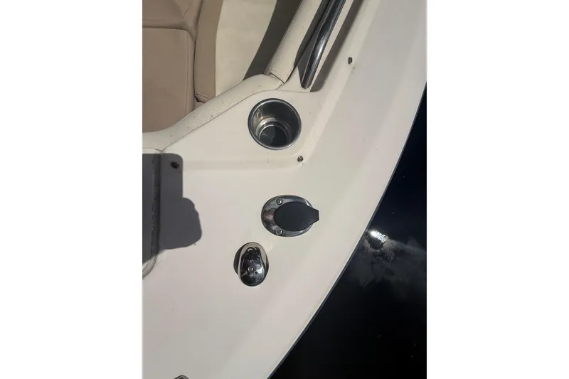 Slide: The Image of 2014 Grady-White Freedom 275 boat deck with cup holder and fittings. - 50