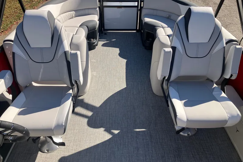 Slide: The Image of Luxurious interior of 2026 Tahoe Pontoon LTZ Quad Lounger with plush seating. - 11