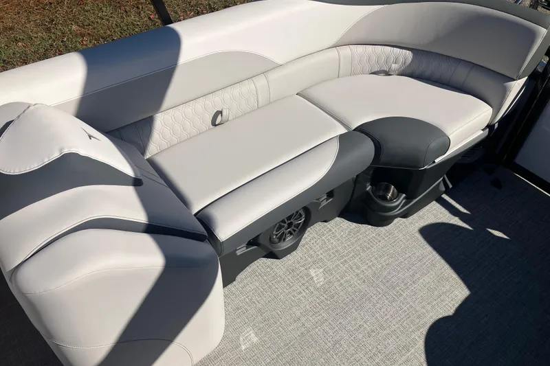 Slide: The Image of 2026 Tahoe Pontoon LTZ Quad Lounger with luxurious seating and modern design. - 13