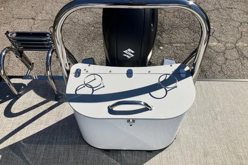 Slide: The Image of 2026 Tahoe Pontoon LTZ Quad Lounger with sleek railing and cup holders. - 16