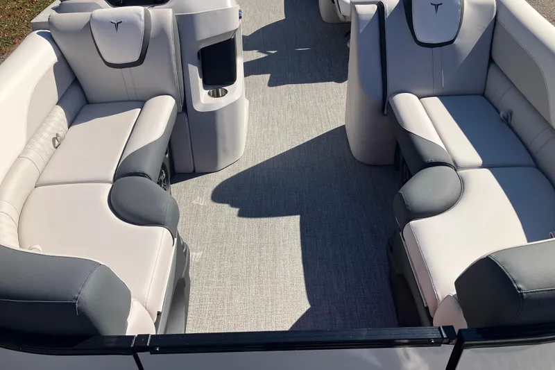 Slide: The Image of 2026 Tahoe Pontoon LTZ Quad Lounger interior with plush seating and modern design. - 8