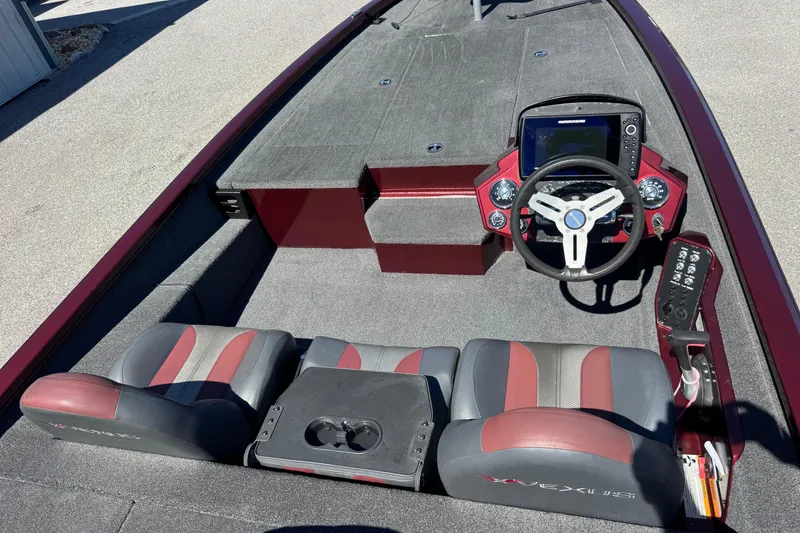 Slide: The Image of 2019 Vexus AVX2080 boat interior with steering wheel and dual seats. - 16