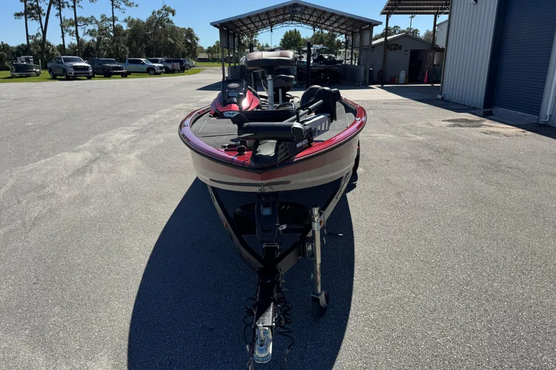 Slide: The Image of 2019 Vexus AVX2080 boat parked outdoors near a storage facility. - 3