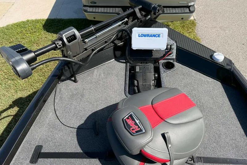 Slide: The Image of 2025 Ranger RT198P boat deck with Lowrance electronics and seating. - 2
