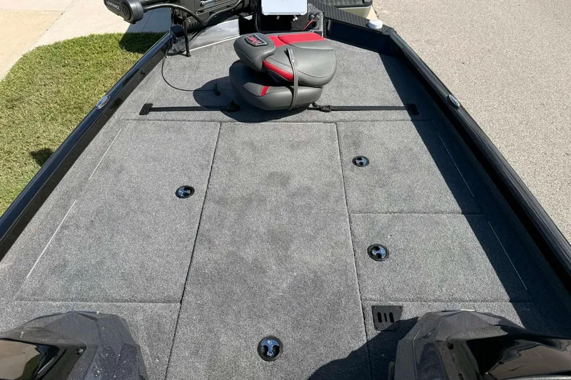 Slide: The Image of 2025 Ranger RT198P boat deck with seating and storage compartments. - 3