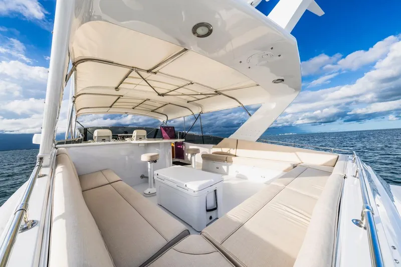 Slide: The Image of Luxurious 2000 Hatteras 74 Cockpit Motor Yacht with spacious deck and ocean view. - 19