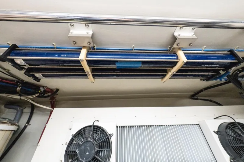 Slide: The Image of Engine room of 2000 Hatteras 74 Cockpit Motor Yacht with ventilation system. - 66