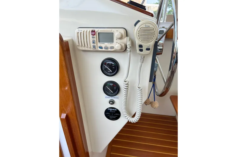 Slide: The Image of Control panel of 2004 Bruckmann Bluestar 38 with radio and gauges. - 31