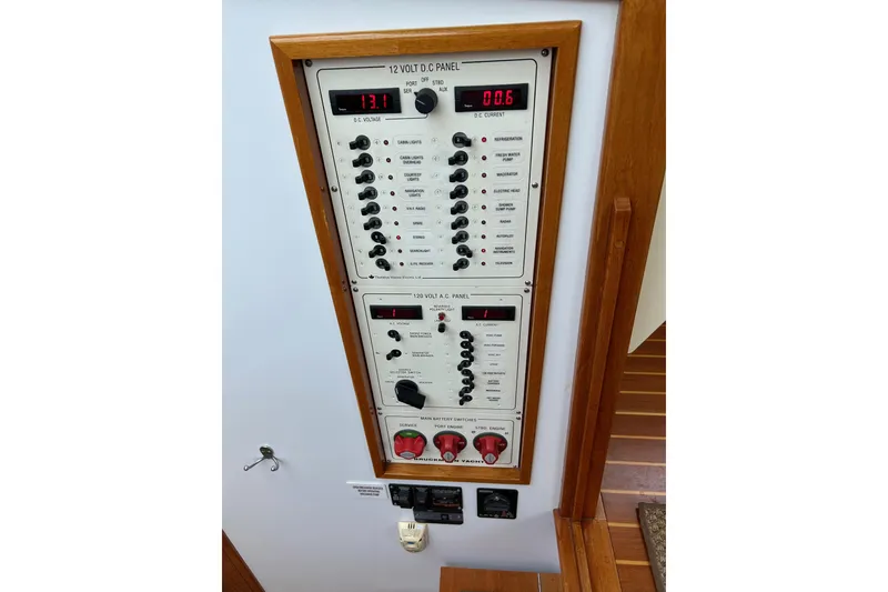 Slide: The Image of Electrical control panel on a 2004 Bruckmann Bluestar 38 boat. - 32