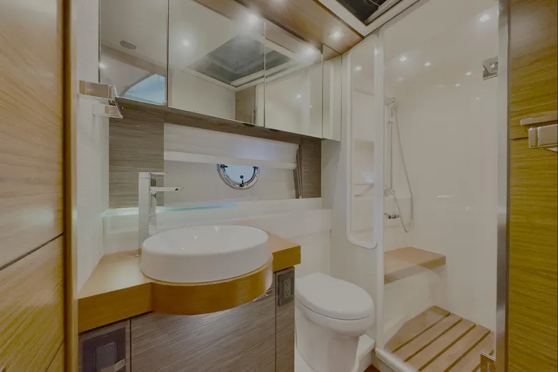 Slide: The Image of Luxurious bathroom in 2020 Tiara Yachts F53 Flybridge with modern fixtures and elegant design. - 21