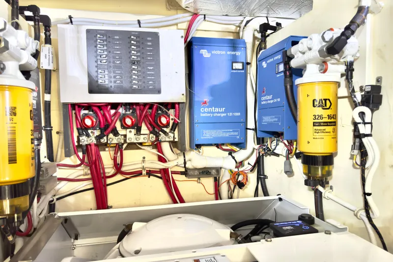 Slide: The Image of Electrical system of 2020 Tiara Yachts F53 Flybridge with battery chargers and wiring. - 34