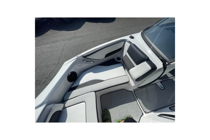 Slide: The Image of 2026 Yamaha Boats AR195 interior seating with sleek design and comfortable upholstery. - 9