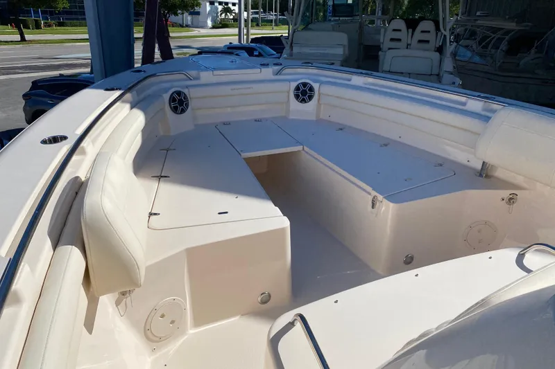 Slide: The Image of 2026 Grady-White Canyon 336 boat interior with spacious seating and storage compartments. - 5