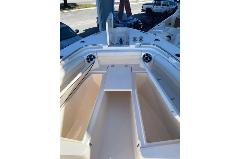 Slide: The Image of 2026 Grady-White Canyon 336 boat interior with open storage compartments. - 6