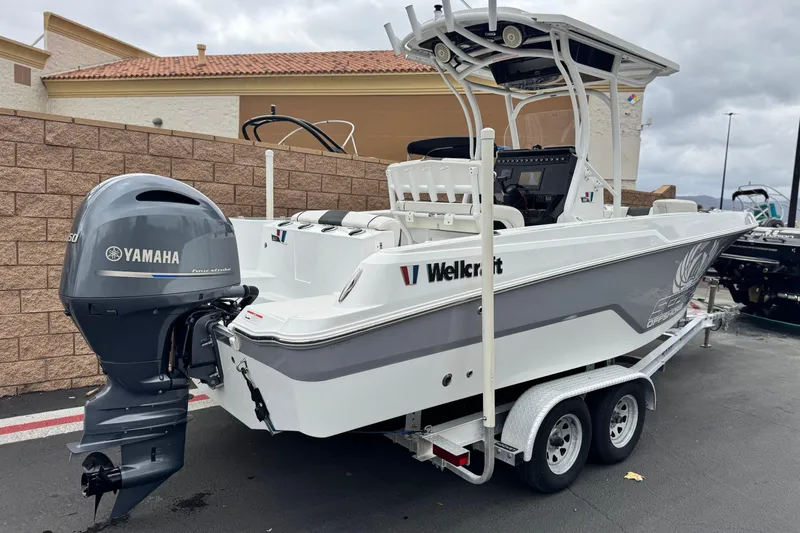 Slide: The Image of 2022 Wellcraft 222 Scarab Offshore boat with Yamaha engine on trailer. - 5