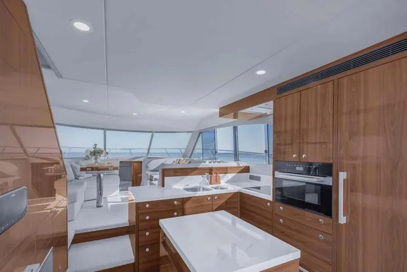 Slide: The Image of Manufacturer Provided Image: Luxurious interior of 2026 Maritimo M50 yacht with modern kitchen and panoramic windows. - 5