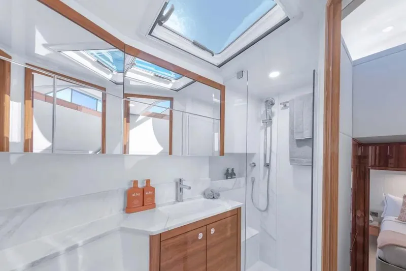 Slide: The Image of Manufacturer Provided Image: Luxurious bathroom interior of 2026 Maritimo M50 yacht with skylight and modern fixtures. - 8