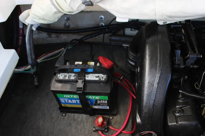 Slide: The Image of Battery and engine compartment of a 2000 Wellcraft 186 SS/S boat. - 24