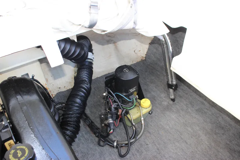 Slide: The Image of Interior view of a 2000 Wellcraft 186 SS/S boat engine compartment. - 25