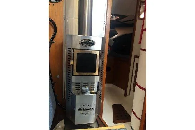 Slide: The Image of Stainless steel stove inside a 1982 Tartan 33 sailboat cabin. - 18