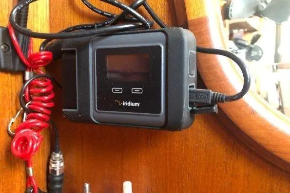 Slide: The Image of Iridium satellite device on 1982 Tartan 33 yacht, with coiled red cable. - 26