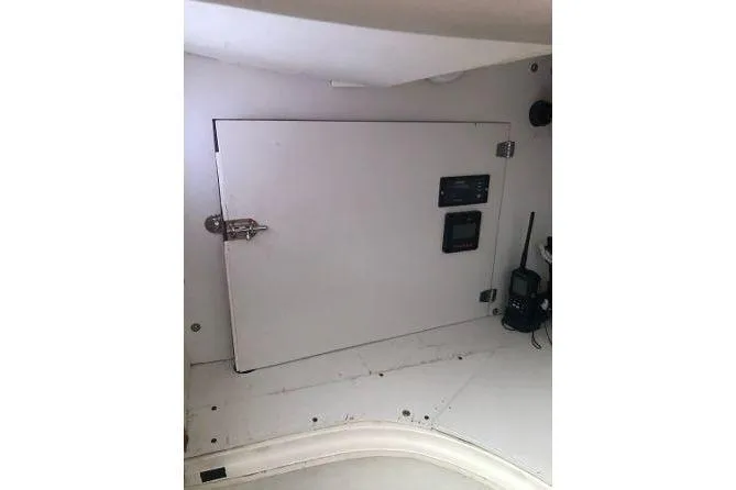 Slide: The Image of Electrical panel inside 1982 Tartan 33 sailboat cabin with radio equipment. - 33