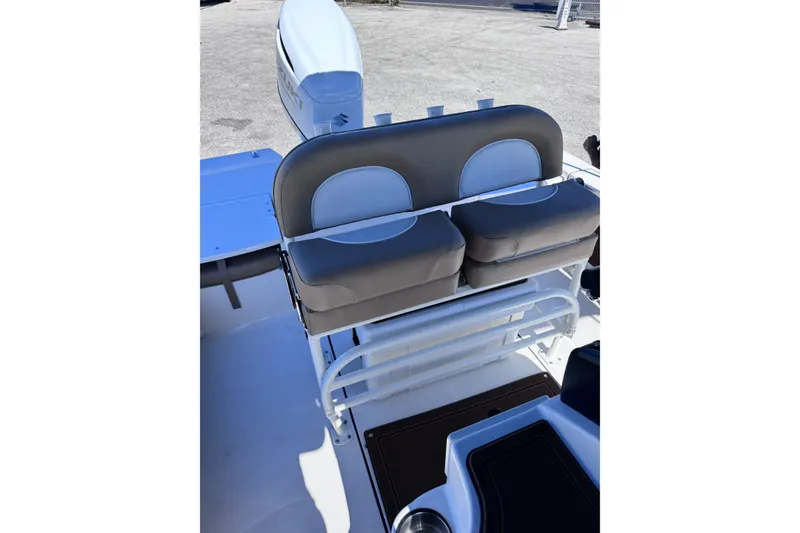 Slide: The Image of 2026 Sea Born FX22 Bay boat seating and console, featuring modern design and comfort. - 14