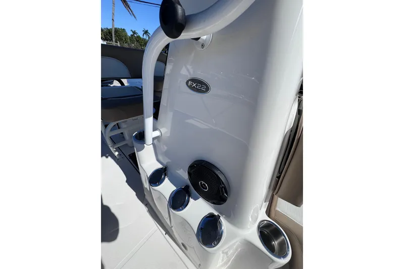 Slide: The Image of 2026 Sea Born FX22 Bay boat console with cup holders and speaker. - 17