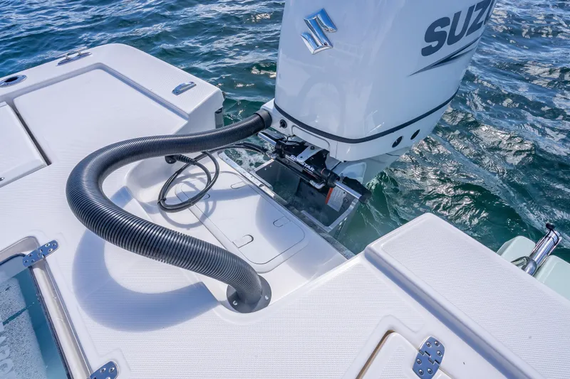 Slide: The Image of 2026 Sea Born FX22 Bay boat with Suzuki outboard motor on water. - 23