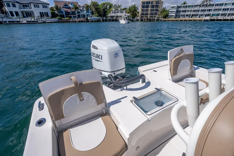 Slide: The Image of 2026 Sea Born FX22 Bay boat with Suzuki engine on calm waters. - 43