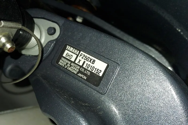 Slide: The Image of Close-up of Yamaha F250XB engine label on 2023 Sportsman Open 232 Center Console. - 43