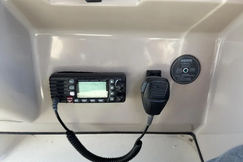 Slide: The Image of 1999 Chaparral Signature 300 boat radio and microphone setup. - 18