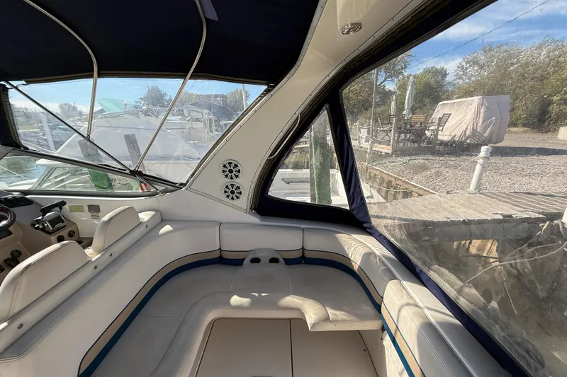Slide: The Image of Interior view of 1999 Chaparral Signature 300 boat with seating and windows. - 9
