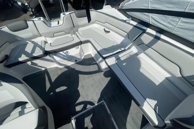 Slide: The Image of 2026 Yamaha Boats AR190 interior with spacious seating and modern design. - 13