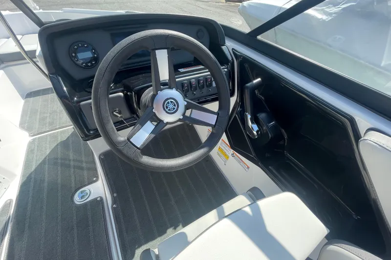 Slide: The Image of 2026 Yamaha AR190 boat cockpit with steering wheel and control panel. - 5