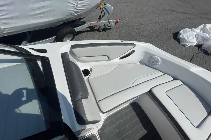 Slide: The Image of 2026 Yamaha Boats AR190 interior with cushioned seating and speaker system. - 9