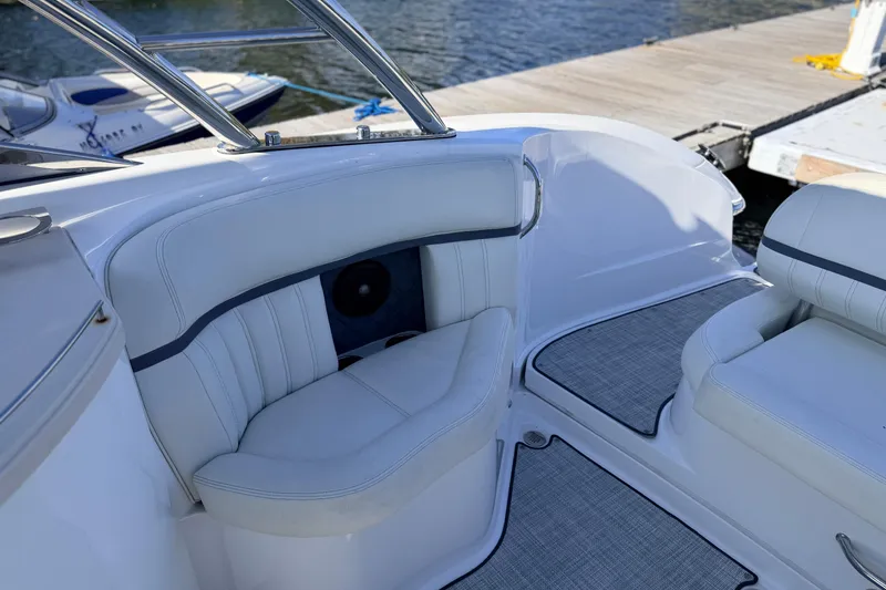 Slide: The Image of Luxurious seating on a 2020 Cobalt R35 boat, docked by the water. - 21