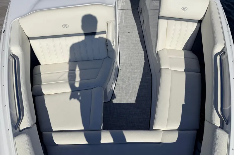 Slide: The Image of 2020 Cobalt R35 boat interior with white leather seats and shadow silhouette. - 30