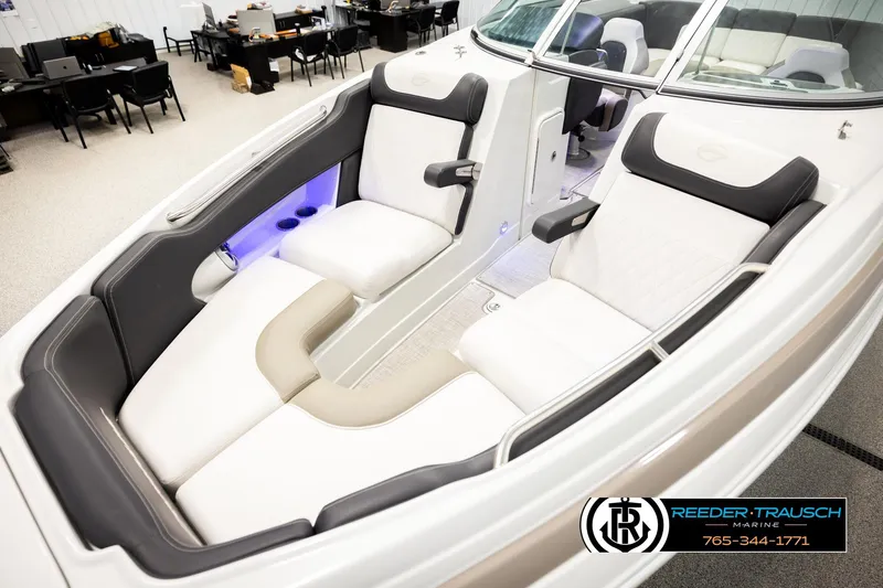 Slide: The Image of 2022 Crownline 265 SS boat interior with luxurious seating and modern design. - 11