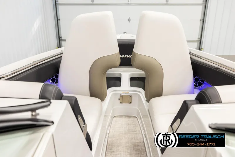 Slide: The Image of Interior of 2022 Crownline 265 SS boat with white seating and modern design. - 17