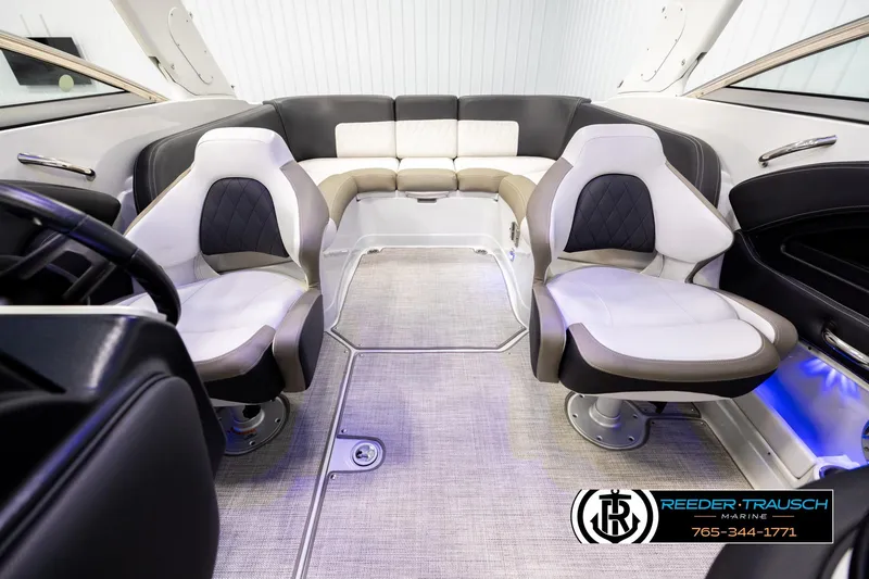Slide: The Image of Interior of 2022 Crownline 265 SS boat with plush seating and modern design. - 19
