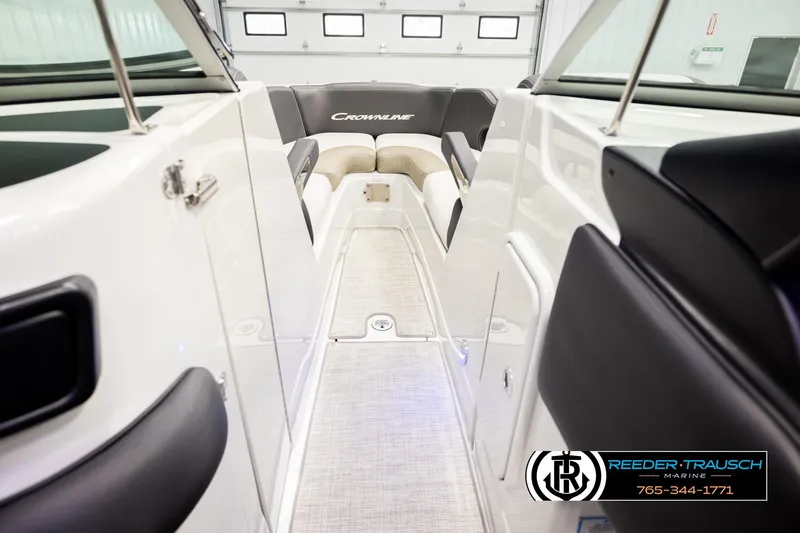 Slide: The Image of 2022 Crownline 265 SS boat interior with sleek seating and modern design. - 32