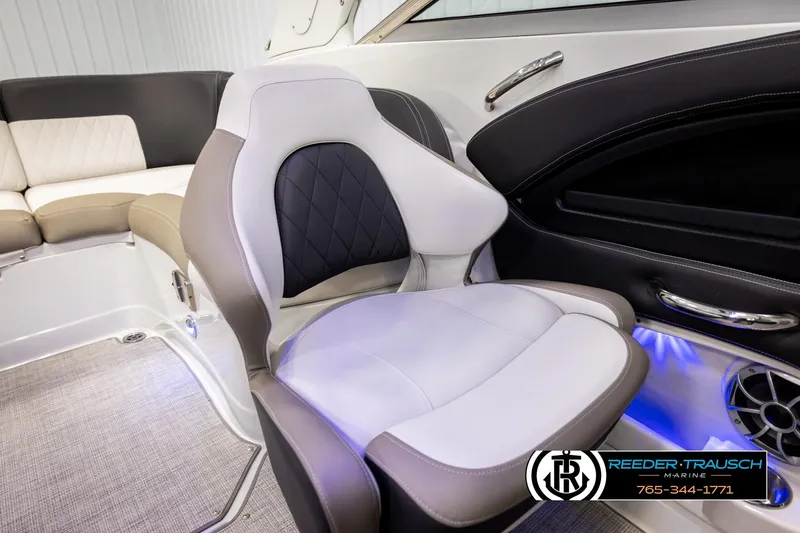 Slide: The Image of 2022 Crownline 265 SS boat interior with luxurious seating and modern design. - 40