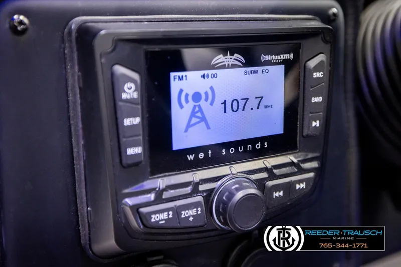 Slide: The Image of Wet Sounds audio system in 2022 Crownline 265 SS boat, tuned to FM 107.7 MHz. - 45