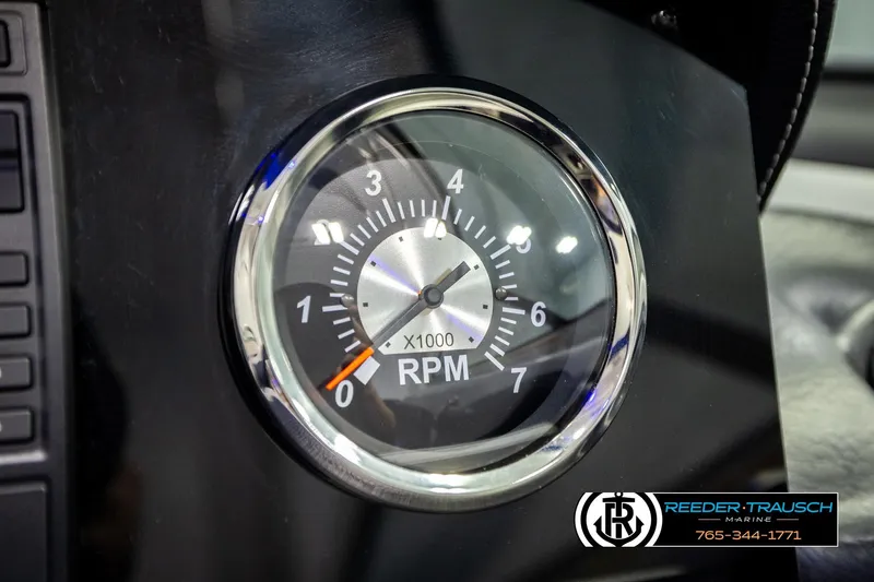 Slide: The Image of Tachometer of 2022 Crownline 265 SS boat, showing RPM gauge. - 49
