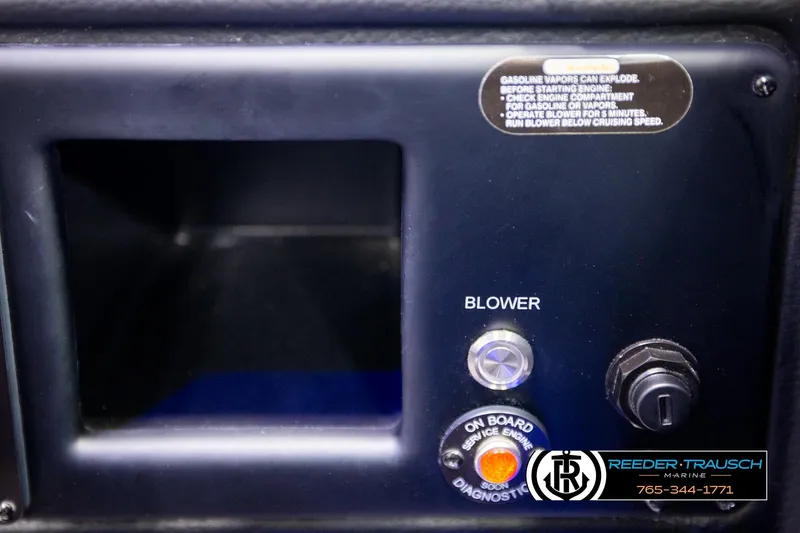 Slide: The Image of Control panel of 2022 Crownline 265 SS boat with blower and diagnostic buttons. - 54