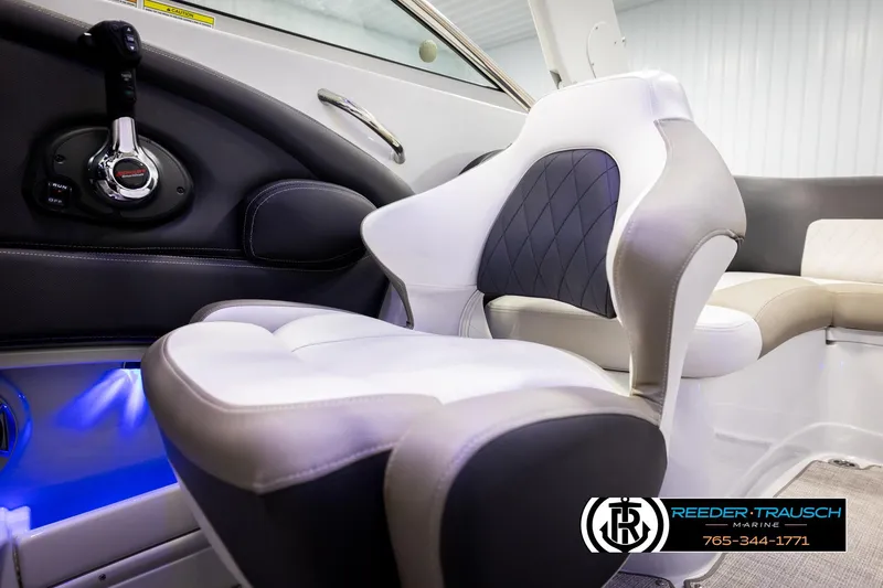 Slide: The Image of 2022 Crownline 265 SS boat interior with luxurious seating and modern controls. - 59