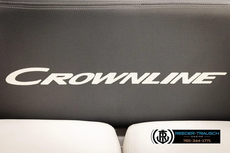 Slide: The Image of Crownline 265 SS 2022 boat interior with logo and Reeder-Trausch Marine contact details. - 62
